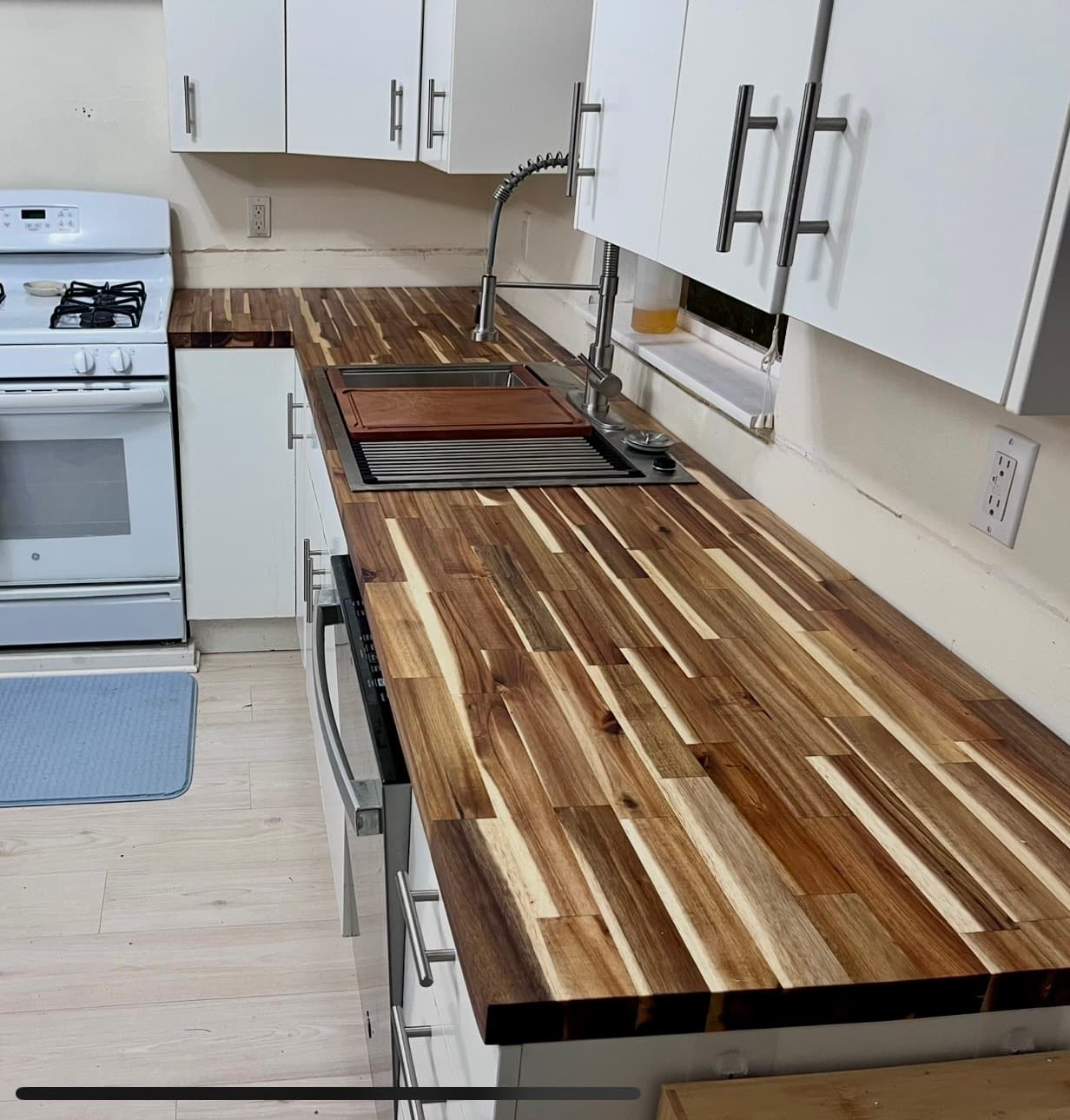 Fitted butcher block countertops installed over white cabinetry, Gainesville FL