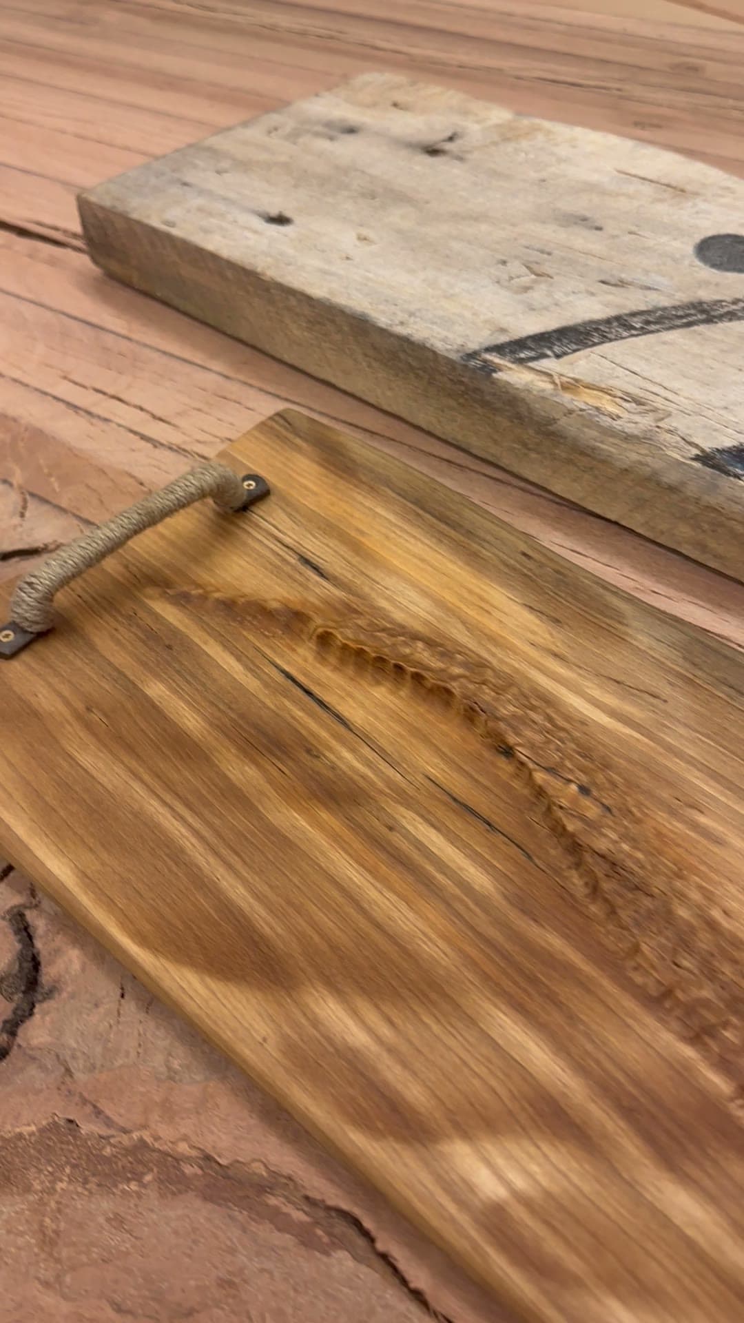 Router surfacing a live-edge board, chips lifting off the continuous grain
