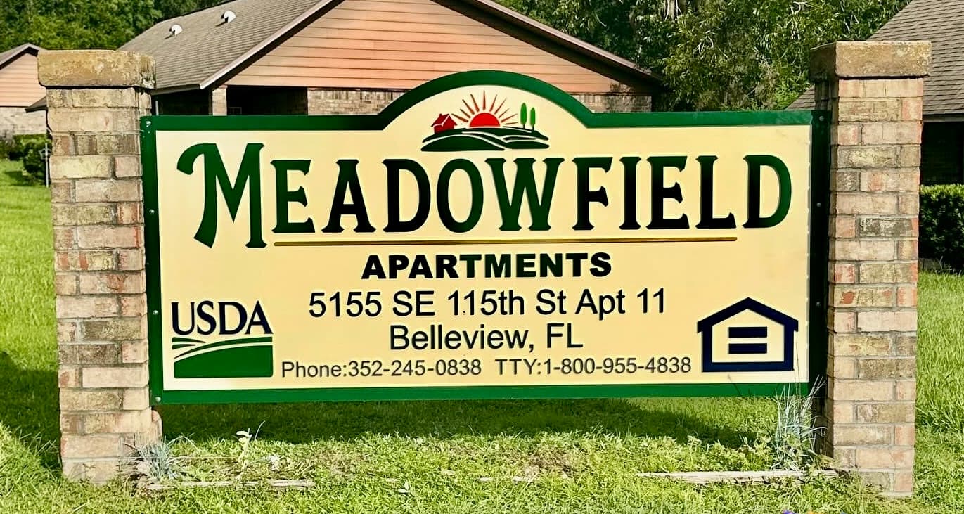 MeadowField monument sign carved detail closeup
